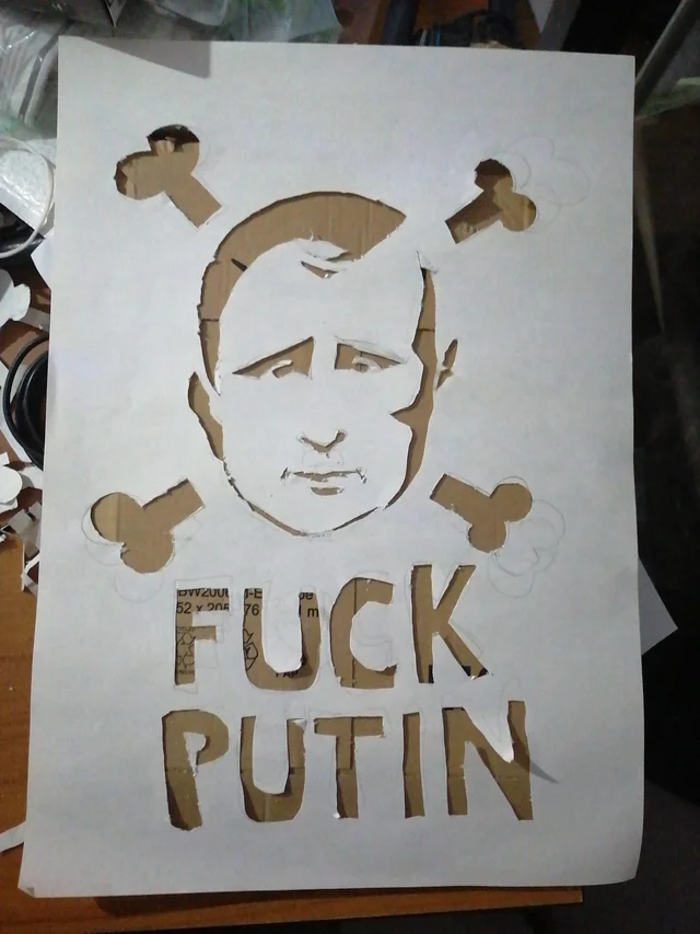 Image of putin with text ‘fuck putin’